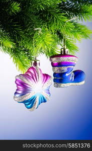 Baubles on christmas tree in celebration concept