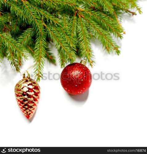 Baubles on fir branch isolated on white background
