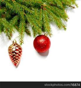 Baubles on fir branch isolated on white background