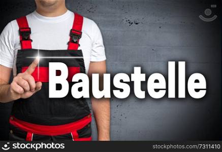 Baustelle  in german Construction  touchscreen is shown by craftsman.. Baustelle  in german Construction  touchscreen is shown by craftsman