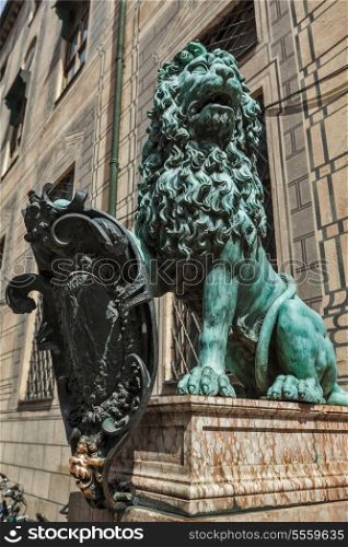 Bavarian lion statue at Munich Alte Residenz palace in Odeonplatz. Munich, Bavaria, Germany
