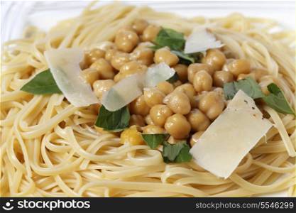 Bavette pasta, almost identical to linguine, served with a chickpea, garlic, chili and parmesan sauce, and garnished with torn basil leaves