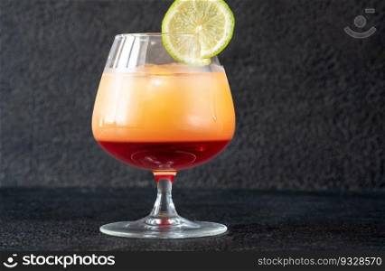 Bay Breeze Cocktail garnished with lime wheel