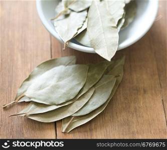 bay leaves on a wooden table
