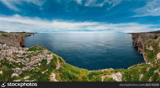Bay of Biscay summer rocky coast view, Spain, Asturias, near Camango. Six shots stitch high-resolution panorama.