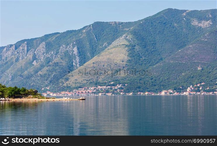 Bay of Kotor summer misty view from up and Kotor town on coast (Montenegro)
