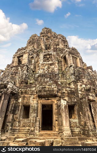 Bayon temple is Khmer ancient temple in complex Angkor Wat in Siem Reap, Cambodia in a summer day