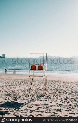 Baywatch chairs on the beach during summer