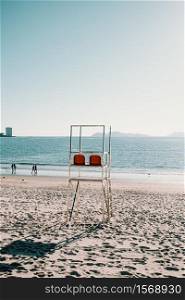 Baywatch chairs on the beach during summer