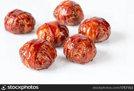 BBQ Bacon Wrapped Meatballs on white background