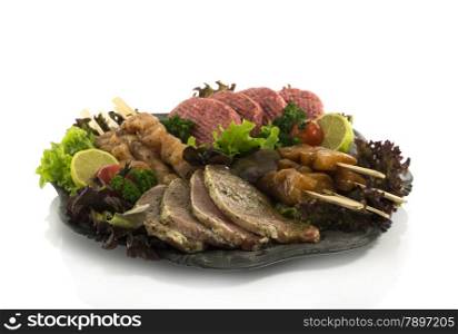 bbq dish with meat and salad isoalted on white