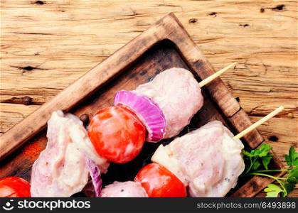 BBQ fresh pork chop slices. Marinated with onion and spices meat, strung on skewers