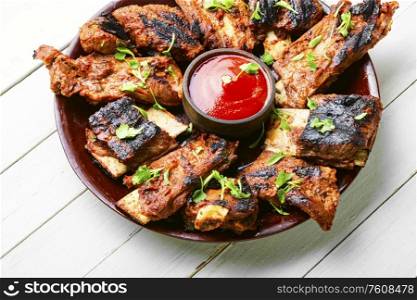 BBQ grilled ribs.Grilled juicy barbecue beef ribs in a plate. Veal fried ribs