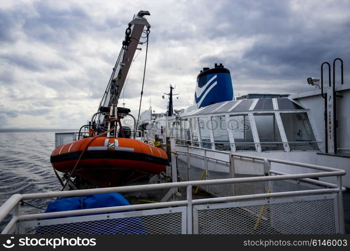 BC ferry and lifeboat at harbor, West Vancouver, British Columbia, Canada