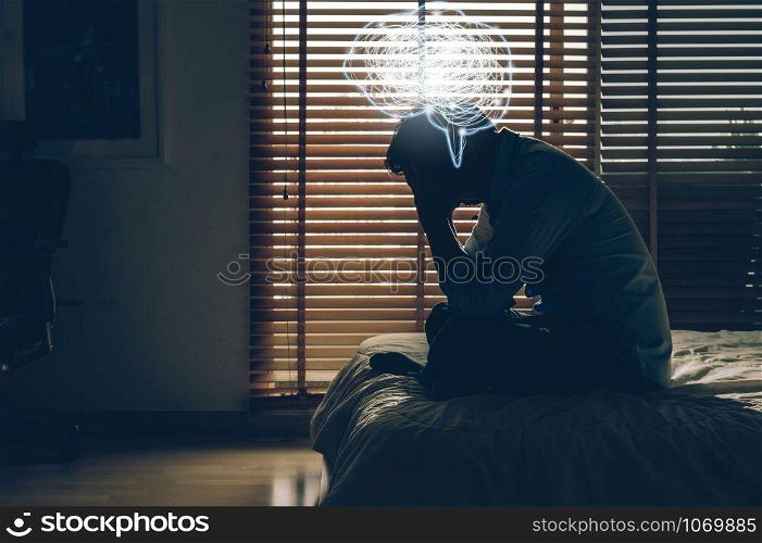 bdepressed man sitting head in hands on the bed in the dark bedroom with low light environment and and Polygonal brain shape with tangle doodle, Depress and stressed concept