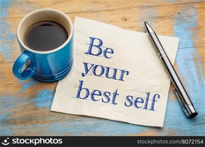 Be your best self - handwriting on a napkin with a cup of espresso coffee