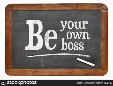 Be your own boss - white chalk text on a vintage slate blackboard