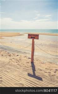 Beach access sign (Vintage filter effect used)