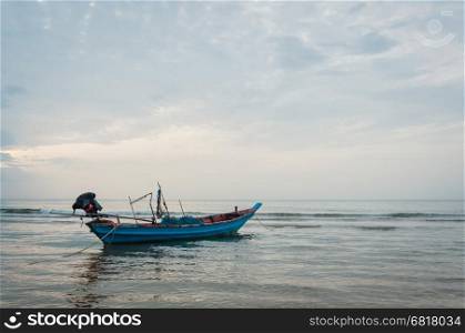 Beach and tropical sea with long-tail boat in thailand