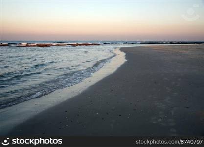 Beach at sundown, Caesarea, Israel