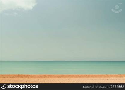 Beach blue ocean and sky background, summer concept . Blurred image of sea and blue sky background with clouds. Nature back, idea banner for holiday or weekend