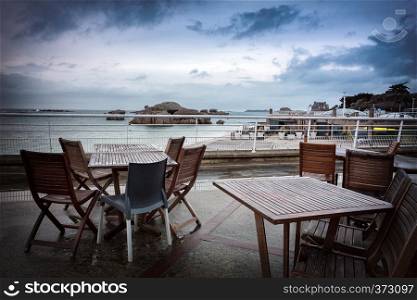 beach cafe and view of the embankment of the city of Trigastel. north of France