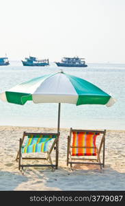 beach chair and umbrella for relax and summer vacation