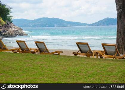 Beach chairs by the sea at phuket.