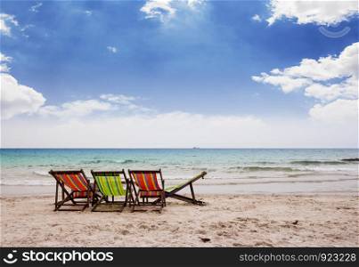 Beach chairs on beautiful tropical beach