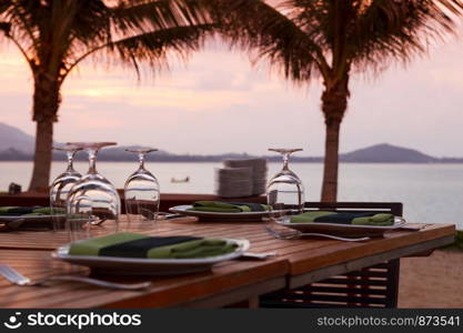 Beach dinner serving at sunset