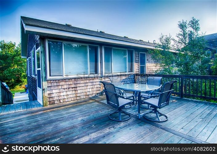 beach house porch deck and patio set at sunrise