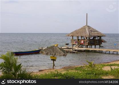 Beach hut on the pier, Paya Bay Resort, Roatan, Bay Islands, Honduras