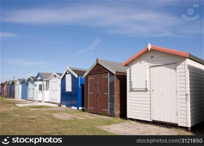 Beach huts near the sea in the UK