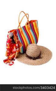 Beach items. Beach items: colorful striped bag, bright kerchief, sunglasses and straw hat