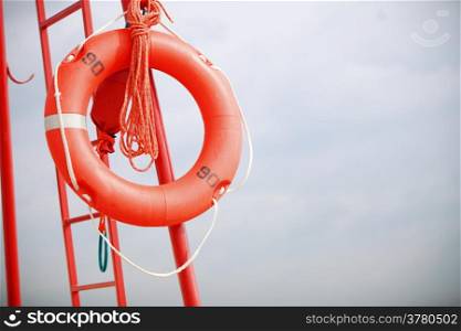 Beach life-saving. Lifeguard rescue equipment orange lifebuoy buoyancy aid