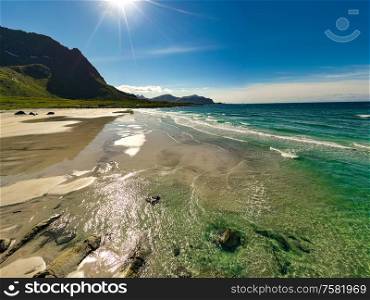 Beach Lofoten islands is an archipelago in the county of Nordland, Norway. Is known for a distinctive scenery with dramatic mountains and peaks, open sea and sheltered bays, beaches