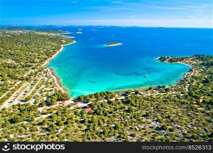 Beach of Kosirna turquoise bay on Murter island aerial view, Dalmatia archipelago of Croatia