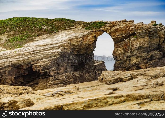 Beach of the Cathedrals, Playa las Catedrales in Ribadeo, province of Lugo, Galicia. Cliff formations on Cantabric coast in northern Spain. Tourist attraction.. Beach of the Cathedrals, Galicia Spain. Place to visit.