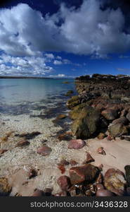 Beach on Gailoch peninsular over looking isle of skye