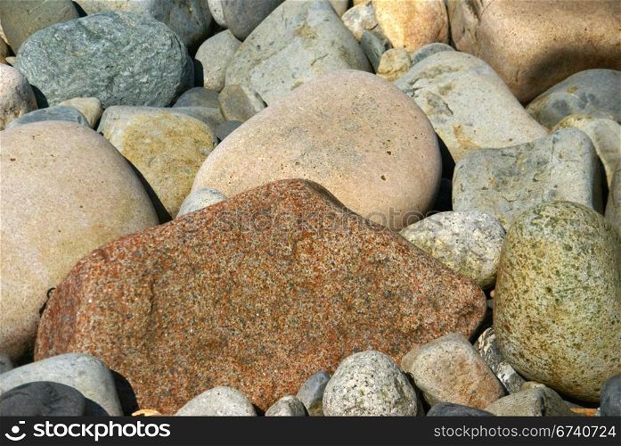 Beach rocks, rounded pebbles from ocean wear, Seawall Mount Desert Island, Acadia National park, Maine, New England