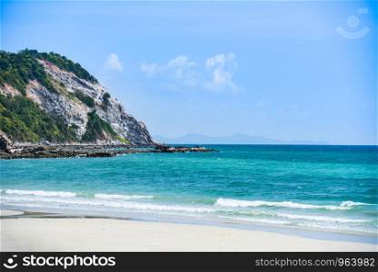 Beach sand tropical sea summer / Island beautiful beach clear water and moody blue sky with hill rock background wallpaper vacation travel holiday landscape sea thailand