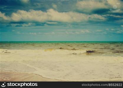 Beach sea and clouds in summer with vintage tone.