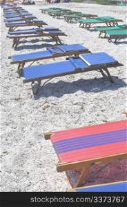 Beach. Shore or beach with sun umbrella and or deckchairs