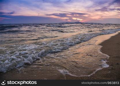 Beach sunset silhouette / Beautiful islands beach sandy on the tropical sea summer colorful orange and purple sky background