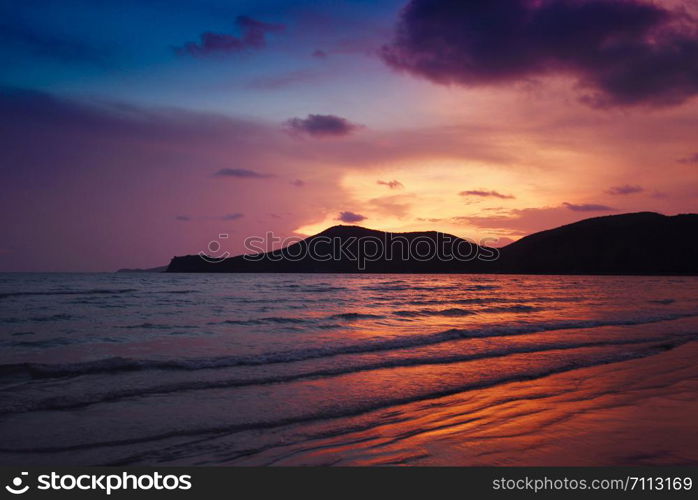 beach sunset silhouette islands beautiful beach sandy on the tropical sea summer colorful orange and blue sky mountain background