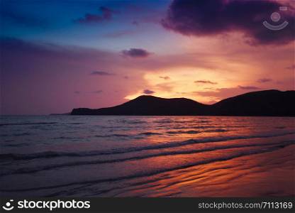beach sunset silhouette islands beautiful beach sandy on the tropical sea summer colorful orange and blue sky mountain background