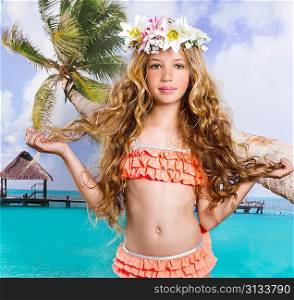 Beach tropical vacation kid blond girl with fashion flowers in head and palm tree vintage color