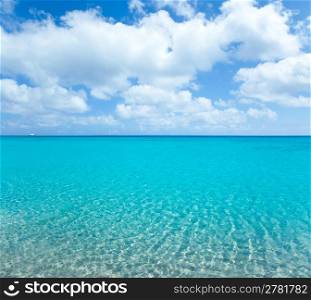 beach tropical with white sand and turquoise water under blue sky