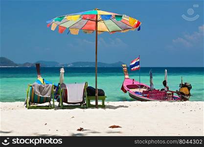 Beach umbrella in Komodo beach in Coral island, Thailand
