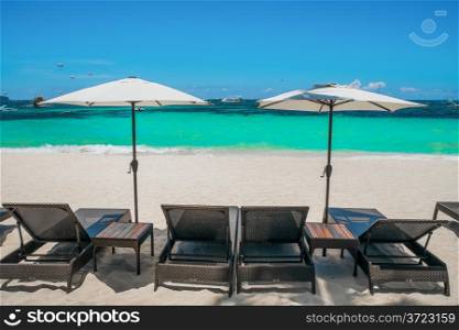 Beach umbrellas and loungers on perfect white beach, Boracay, Philippines